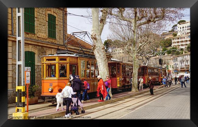 Catching The Tram At Puerto Soller Framed Print by Peter F Hunt