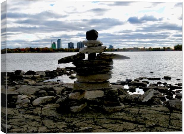 Inukshuk on the shores of the Ottawa River, Gatineau, Quebec Canvas Print by Stephanie Moore