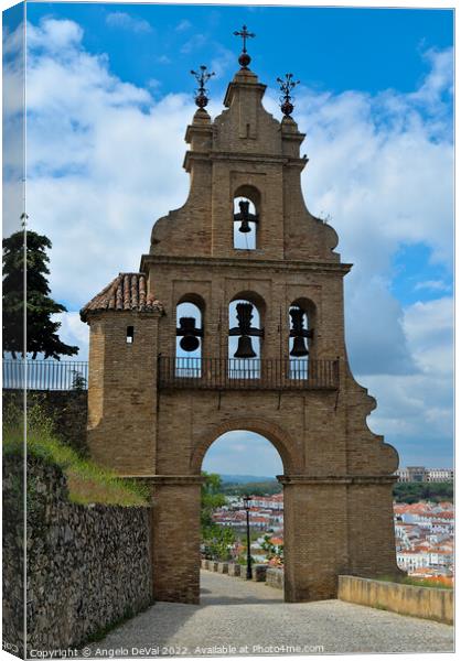 Arched gate and bells in Aracena Canvas Print by Angelo DeVal