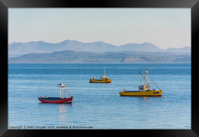 Boats moored in Morecambe Bay Framed Print by Keith Douglas