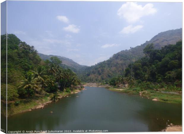 a river flowing between two mountain a view from Idukki Kerala Canvas Print by Anish Punchayil Sukumaran