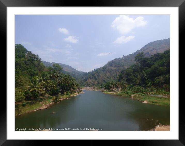 a river flowing between two mountain a view from Idukki Kerala Framed Mounted Print by Anish Punchayil Sukumaran