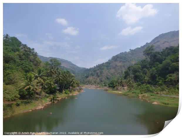 a river flowing between two mountain a view from Idukki Kerala Print by Anish Punchayil Sukumaran