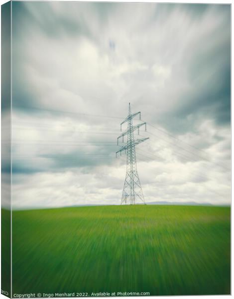High voltage power line in the green field in Germany in the center of a radial blur Canvas Print by Ingo Menhard