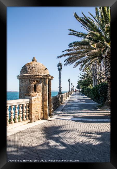 'Strolling in Cadiz: A Coastal Symphony' Framed Print by Holly Burgess