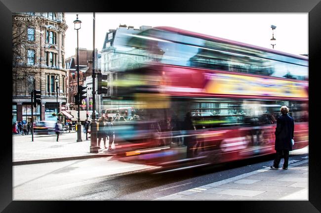London Bus in motion Framed Print by Daniel Gwalter