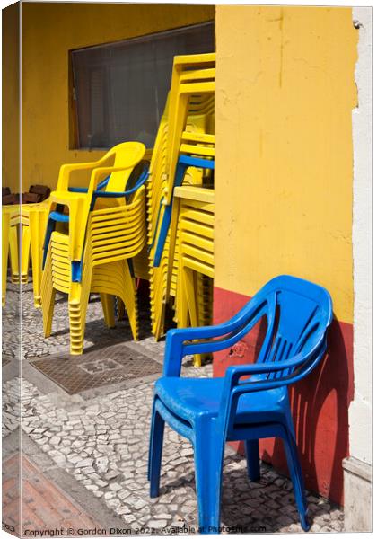 Colourful street scene - Stacking chairs - Curitiba, Brazil Canvas Print by Gordon Dixon