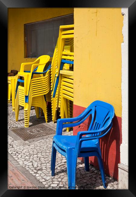 Colourful street scene - Stacking chairs - Curitiba, Brazil Framed Print by Gordon Dixon