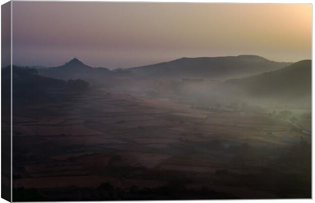 Mist of Plateau fields of Gozo, Malta Canvas Print by Maggie Bajada