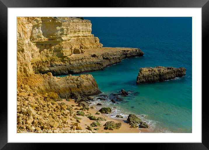Rocks and cliff in Deserta beach Framed Mounted Print by Angelo DeVal