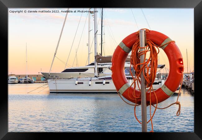 the boats anchored at the  harbor Framed Print by daniele mattioda