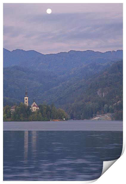 Moon setting at sunrise over Lake Bled Print by Ian Middleton
