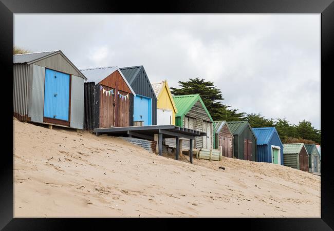 Beach huts in Abersoch Bay Framed Print by Jason Wells