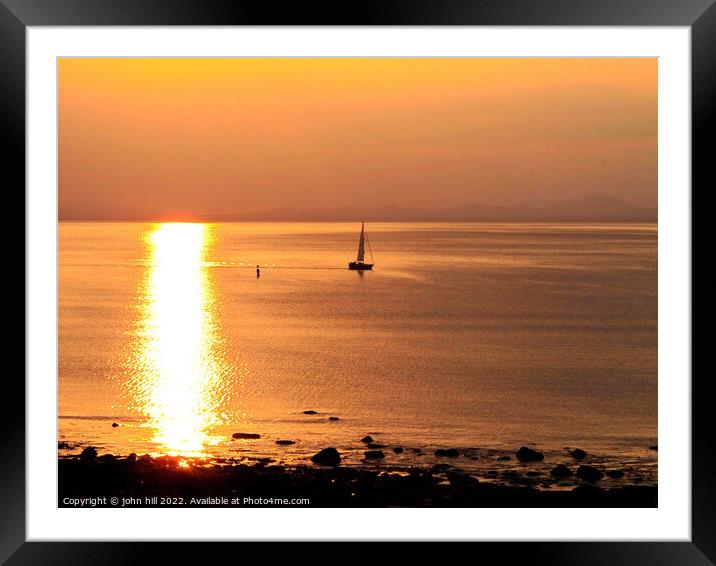 Lone Yacht in the sunset. Framed Mounted Print by john hill