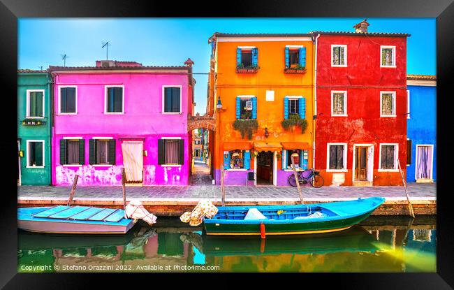 Burano island canal, colorful houses and boats, Framed Print by Stefano Orazzini