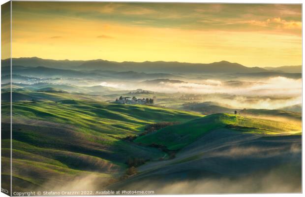 Volterra foggy landscape, rolling hills at sunset. Tuscany Canvas Print by Stefano Orazzini