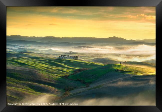 Volterra foggy landscape, rolling hills at sunset. Tuscany Framed Print by Stefano Orazzini