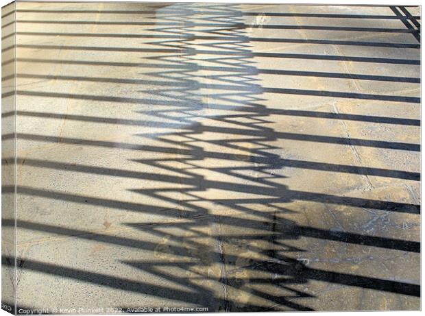 shadows Canvas Print by Kevin Plunkett