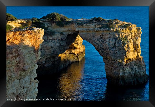 Cliff Arch in Albandeira Beach during Sunset Framed Print by Angelo DeVal