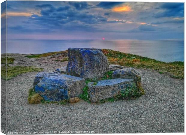 Moody sunset at Widemouth Bay Bude Cornwall  Canvas Print by Andrew Denning