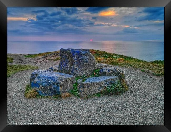 Moody sunset at Widemouth Bay Bude Cornwall  Framed Print by Andrew Denning
