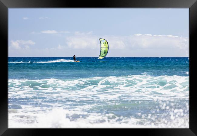 Kitesurfer on blue seas at  El Medano Tenerife Framed Print by Phil Crean