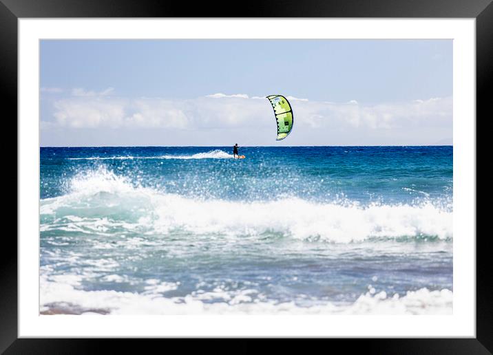 Kitesurfer on blue seas at  El Medano Tenerife Framed Mounted Print by Phil Crean
