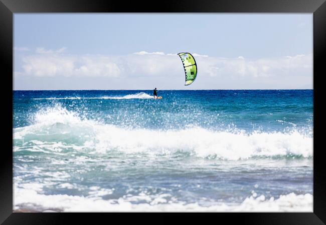 Kitesurfer on blue seas at  El Medano Tenerife Framed Print by Phil Crean