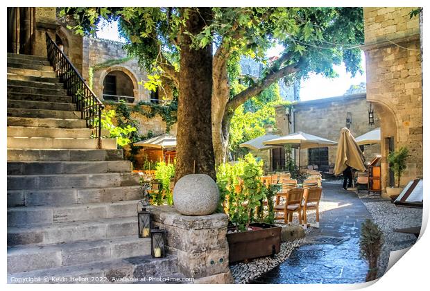 Sunny courtyard in Rhodes Town, Greece Print by Kevin Hellon