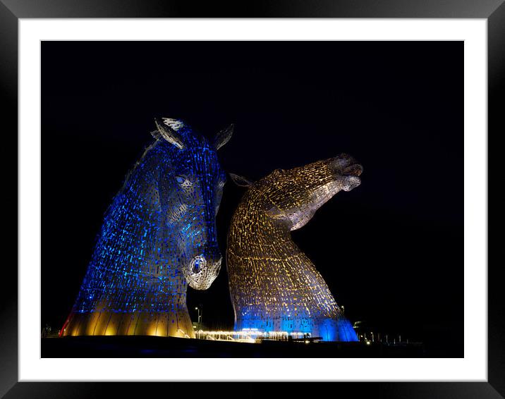 The Kelpies at night. Framed Mounted Print by Tommy Dickson