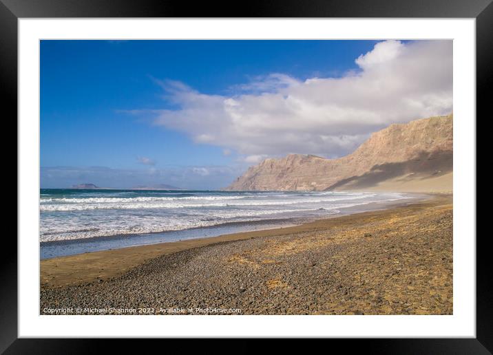 The beach and cliffs at Famara, Lanzarote Framed Mounted Print by Michael Shannon