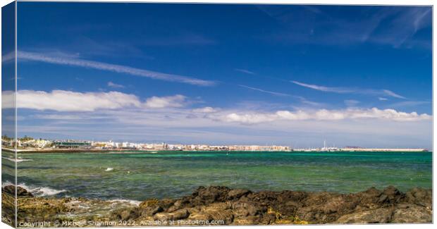 Harbour and seafront, Corralejo, Fuerteventura Canvas Print by Michael Shannon