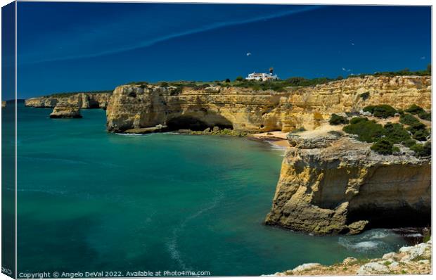 Cliffs and sea scenery in Lagoa Canvas Print by Angelo DeVal