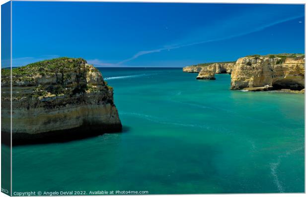 Turquoise by the Cliffs in Algarve Canvas Print by Angelo DeVal