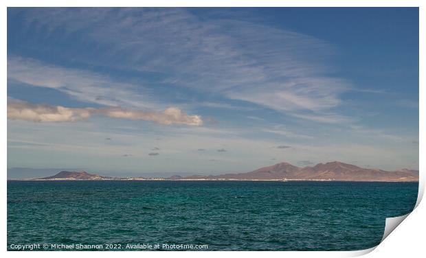 Looking across the sea from Fuerteventura to Playa Print by Michael Shannon