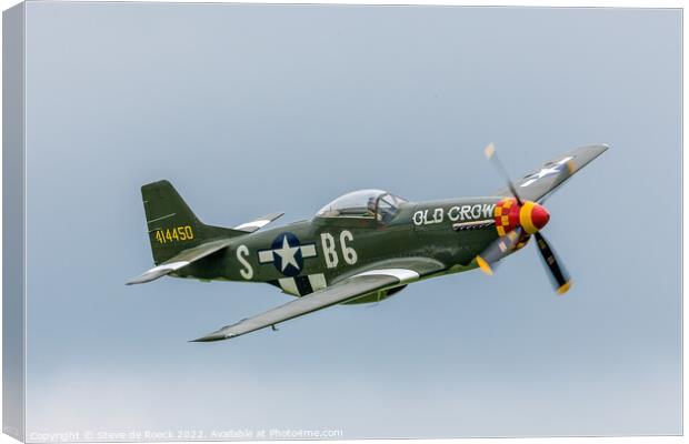 North American P51D Old Crow flies by in a darkening sky. Canvas Print by Steve de Roeck