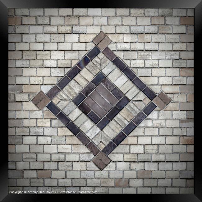 Brick Wall With Pattern Framed Print by Antony McAulay