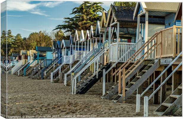 Beach huts in Norfolk, sandy beach, coastline Canvas Print by Eszter Imrene Virt