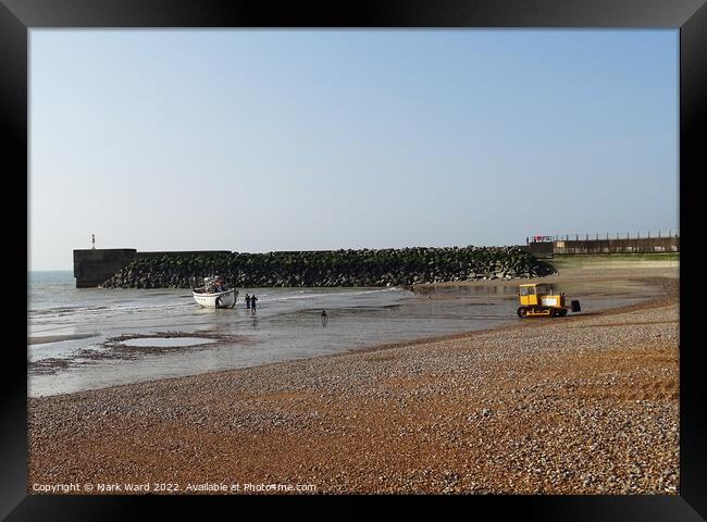 A Hastings fishing boat returning to the shingle beach. Framed Print by Mark Ward