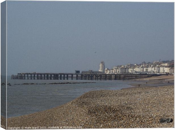 Hastings Pier from the beach. Canvas Print by Mark Ward