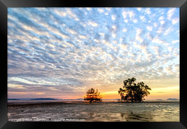 Trees at sunrise against a mackerel sky,  Framed Print by Kevin Hellon