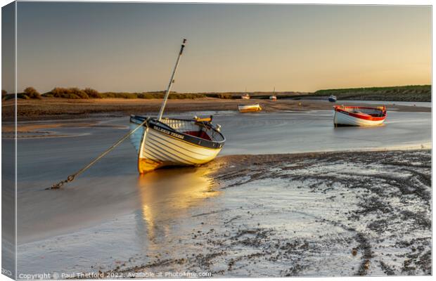 Golden light at Burnham Overy Staithe Canvas Print by Paul Thetford