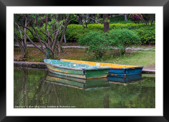 Two old boats Framed Mounted Print by Stan Lihai