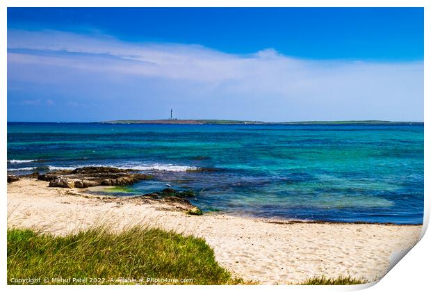 Deserted sandy beach at Punta Prima looking out to lighthouse on Print by Mehul Patel