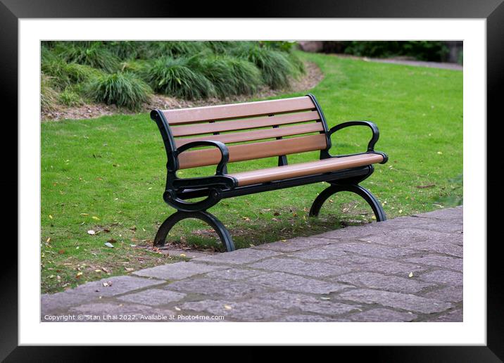 Brown bench in the park Framed Mounted Print by Stan Lihai