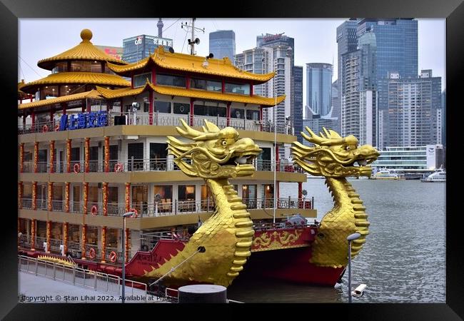 Dragon boat on Huangpu river  Framed Print by Stan Lihai