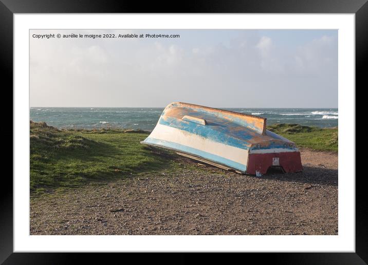 Boat turn upside down to winterize Framed Mounted Print by aurélie le moigne