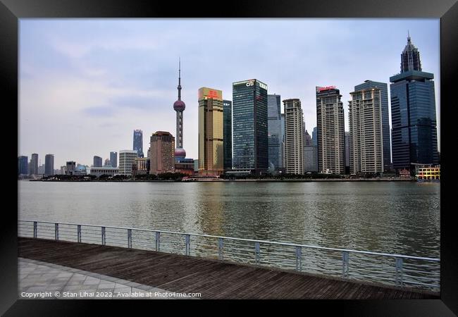 Shanghai TV tower among skyscrapers Framed Print by Stan Lihai