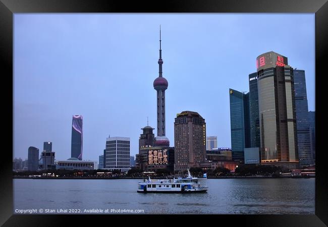 Shanghai skyscrapers in the evening Framed Print by Stan Lihai