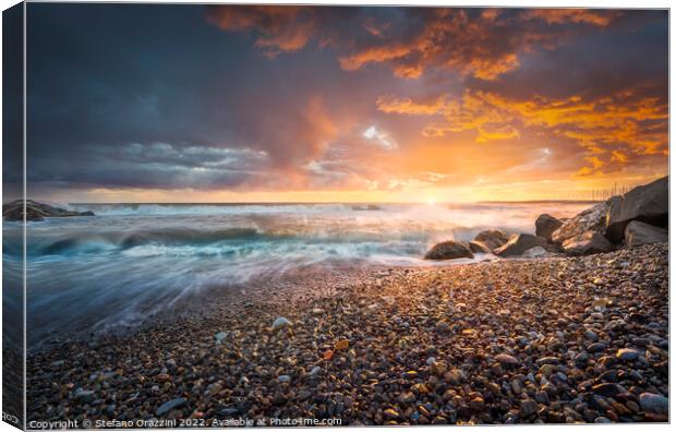 Stormy sea waves and foam at sunset. Marina di Cecina beach Canvas Print by Stefano Orazzini